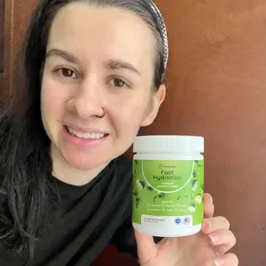customer-holding-rosabella-electrolyte-drink-powder.webp__PID:f643cb3d-56a5-48c5-a189-f62e06c79b79